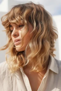 Beachy Wavy Wolf Cut + Tousled Bangs
