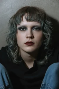 Grunge Curtain Bangs + Messy Layers